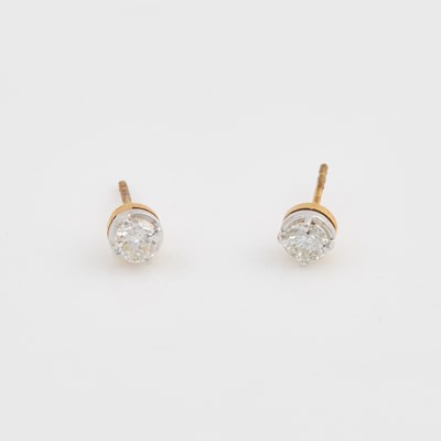 Lot 110 - Two Diamond Earrings about 1.10 cts., 14K 1 dwt.