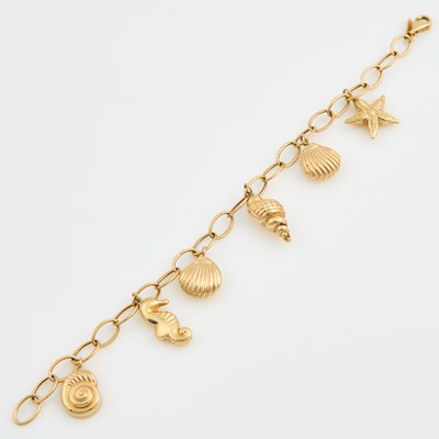 Lot 212 - Gold Charm Bracelet with 6 charms attached, 14K 6 dwt.
