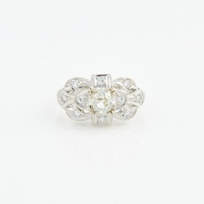 Lot 235 - Diamond Ring, 11 diamonds, center stone about 0.40 ct., 14K 2 dwt., stone damaged