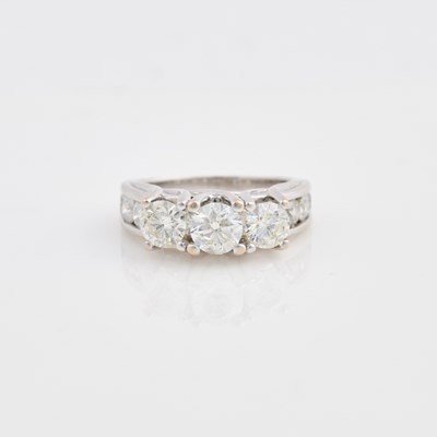 Lot 262 - Diamond Ring, 14 diamonds, 3 stones about 1.70 cts., 11 stones about 1.50 cts., 14K 5 dwt.