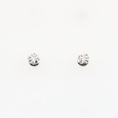 Lot 314 - Two Diamond Solitaire Earrings, about 1.00 ct., 14K 1 dwt.