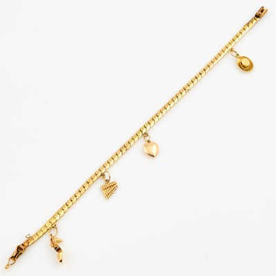 Lot 342 - Gold Charm Bracelet with 4 charms attached, 18K and 14K 7 dwt. all