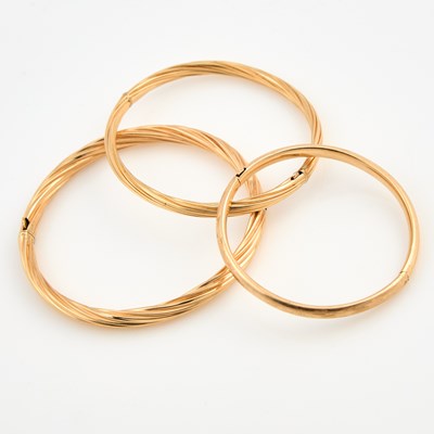 Lot 369 - Three Gold Rigid Bracelets, 14K 13 dwt.