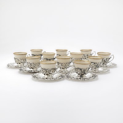 Lot 207 - Set of Twelve American Sterling Silver and Lenox Porcelain Demitasse Cups and Saucers