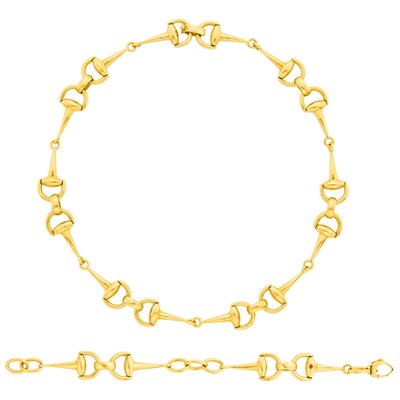 Lot 9 - Roberto Coin Gold and Ruby Horsebit Necklace and Bracelet
