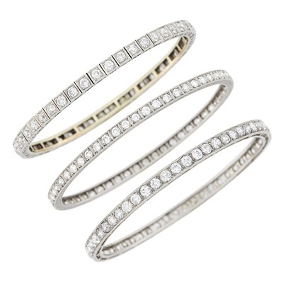 Lot 197 - Three Platinum and Diamond Bangle Bracelets