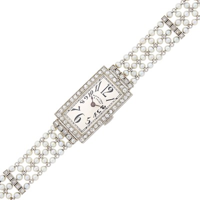 Lot 58 - Black Starr & Frost Platinum, Seed Pearl and Diamond Mesh Wristwatch