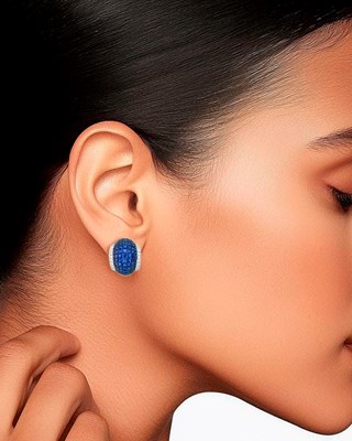 Lot 45 - Pair of White Gold, Invisibly-Set Sapphire and Diamond Bombé Earclips