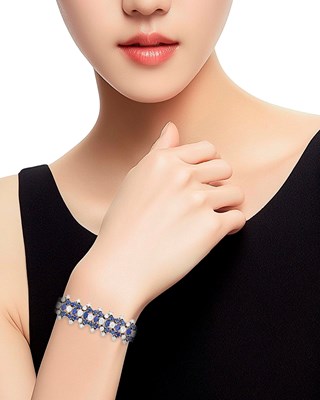 Lot 44 - White Gold, Diamond and Sapphire Bracelet