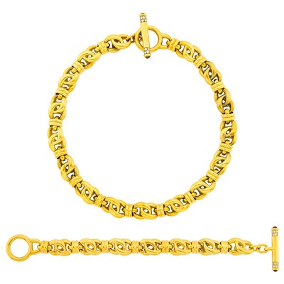 Lot 1173 - Gold Link Necklace and Bracelet with Cabochon Ruby and Diamond Toggle Clasps