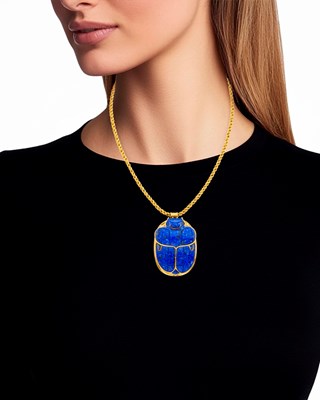 Lot 18 - Gold and Carved Lapis Scarab Pendant with Gold Chain Necklace