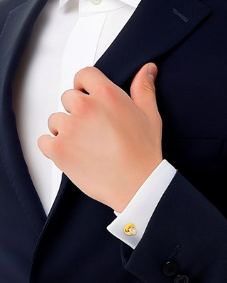 Lot 94 - Cartier Pair of Tricolor Gold 'Love Knot' Cufflinks