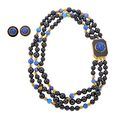 Lot 1245 - Harry Fireside Triple Strand Black Onyx, Lapis, Gold and High Karat Gold Necklace and Pair of Earrings