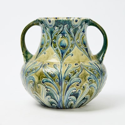 Lot 117 - William Moorcroft Florian Ware Glazed Earthenware Twin-Handled "Peacock" Vase