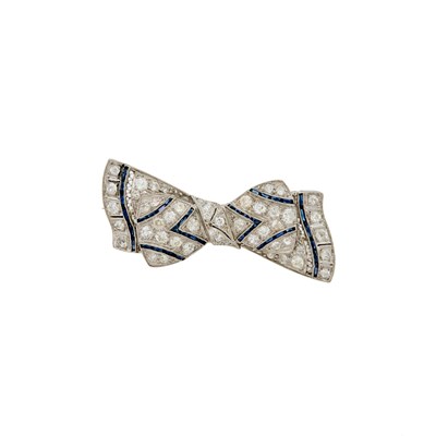 Lot 1058 - Platinum, Diamond and Synthetic Sapphire Bow Brooch