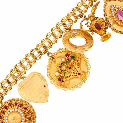 Lot 1311 - Gold and Colored Stone Charm Bracelet