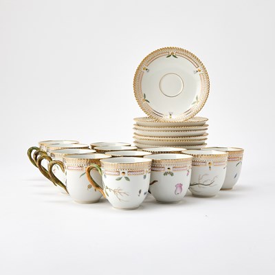 Lot 117 - Twelve Royal Copenhagen Gilt and Hand-Painted Porcelain 'Flora Danica' Pattern Teacups and Saucers