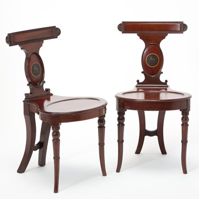 Lot 293 - Pair of Regency Heraldic Mahogany Hall Chairs