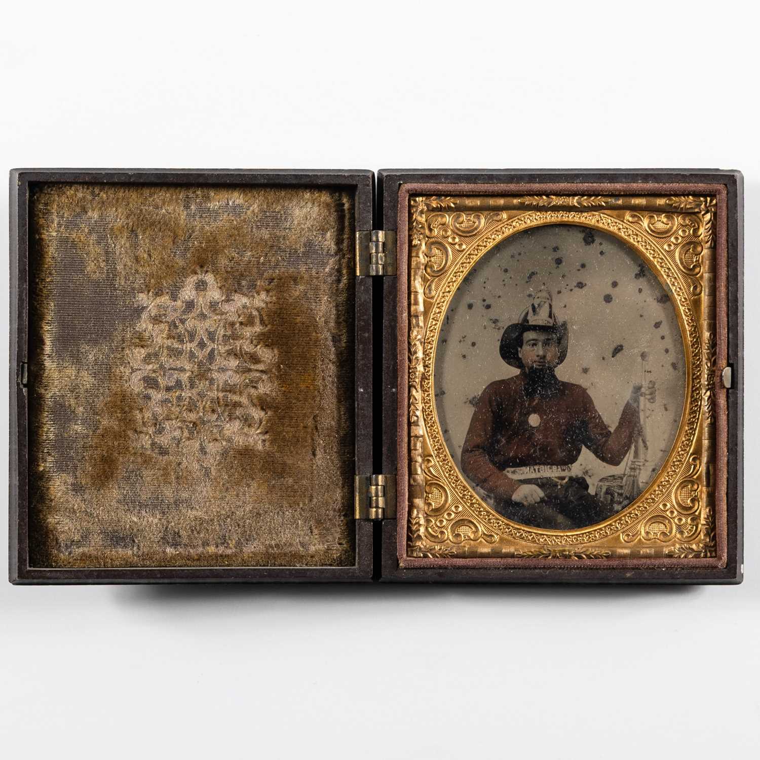 Lot 1 - An unusual Ambrotype of a fireman in a spectacular case