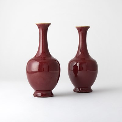 Lot 219 - A Pair of Chinese Copper Red Glazed Porcelain Vases
