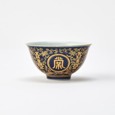 Lot 208 - A Chinese Gilt-Decorated Powder Blue Porcelain Cup