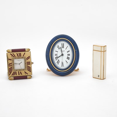 Lot 3234 - Two Cartier Art Deco Style Enameled Desk Clocks and a Cartier Enameled Metal Cigarette Lighter