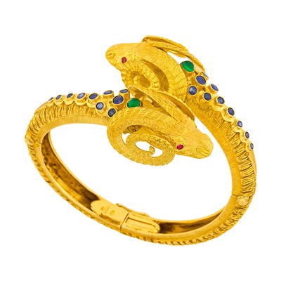 Lot 21 - Zolatas Gold and Gem-Set Ram's Head Crossover Bangle Bracelet