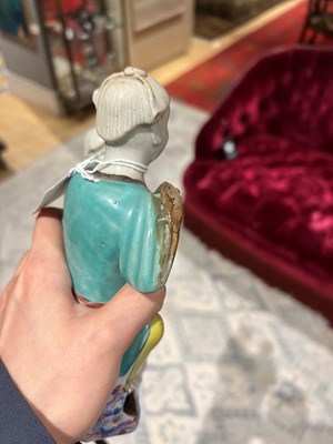 Lot 108 - Chinese Enameled Porcelain Figure of Hehe Erxian