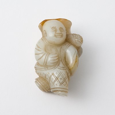 Lot 350 - A Chinese White Jade Figural Carving of a Boy