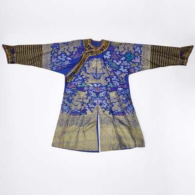Lot 104 - A Chinese Brocade Silk Blue Ground Dragon Robe