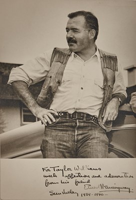 Lot 93 - A superb inscribed photograph by Ernest Hemingway in Sun Valley, 1940