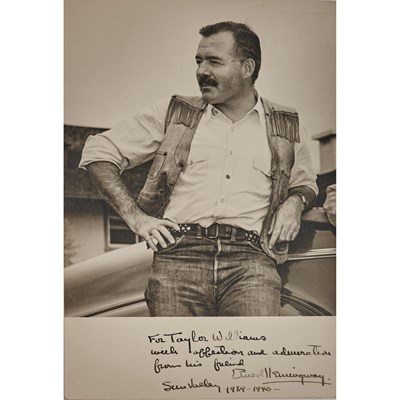 Lot 93 - A superb inscribed photograph by Ernest Hemingway in Sun Valley, 1940