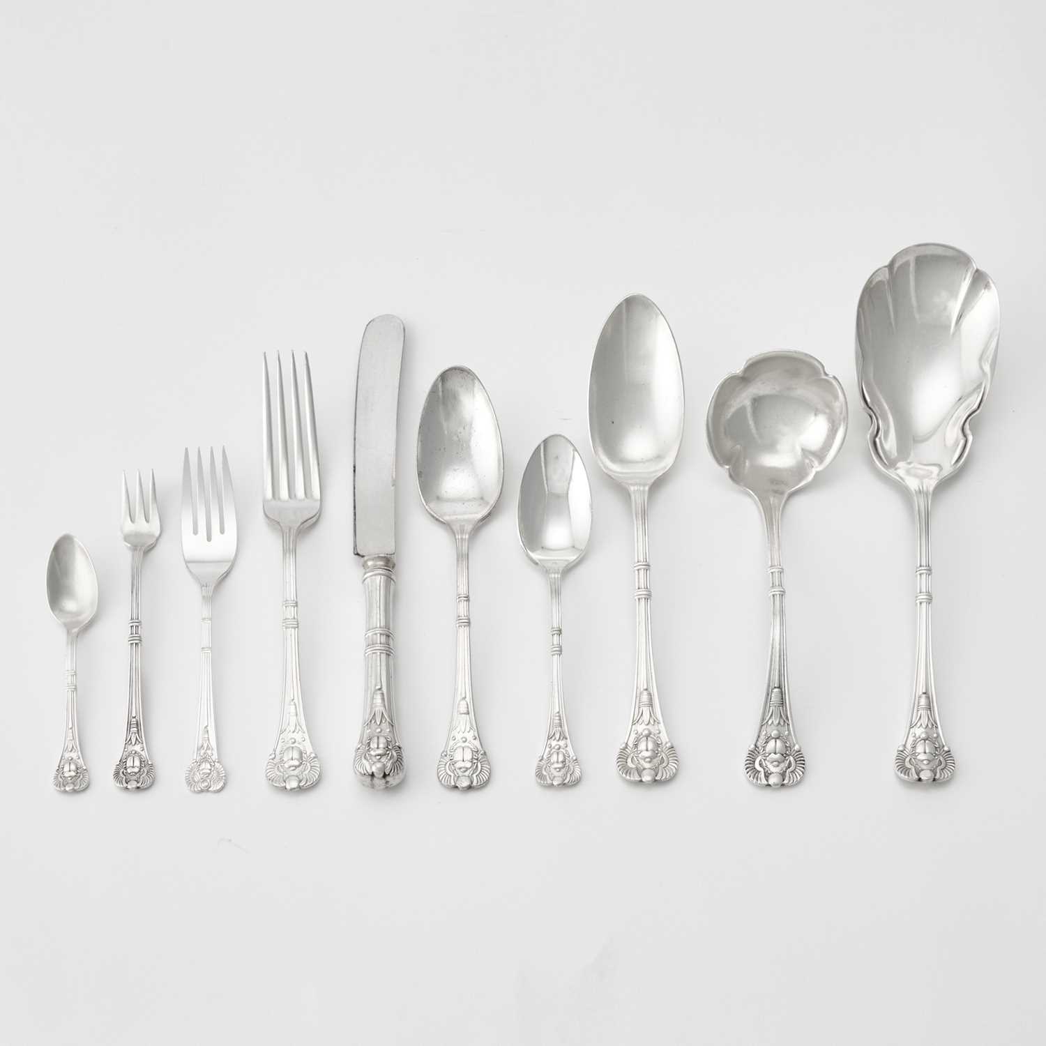 Lot 156 - American Assembled Silver Plated “Antique Egyptian/Scarab” Pattern Flatware Service