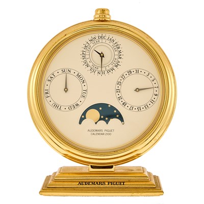 Lot 1251 - Audemars Piguet Gilt-Brass 'Calendar 2100' Desk Clock, Ref. 124