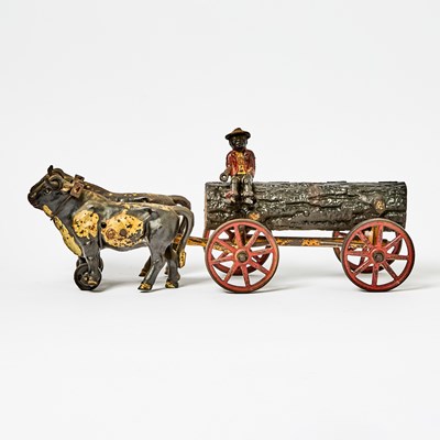 Lot 1223 - Hubley Painted Cast Iron Ox-drawn Log Wagon Toy