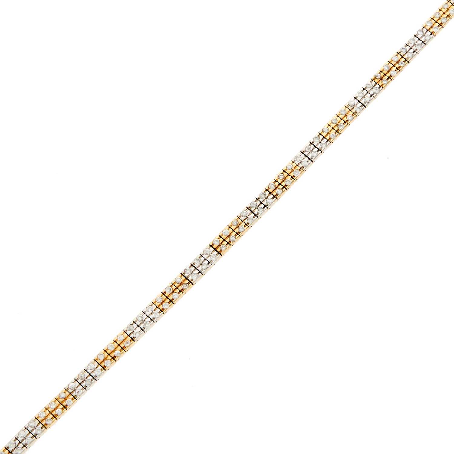Lot 1063 - Two-Color Gold and Simulated Diamond Bracelet