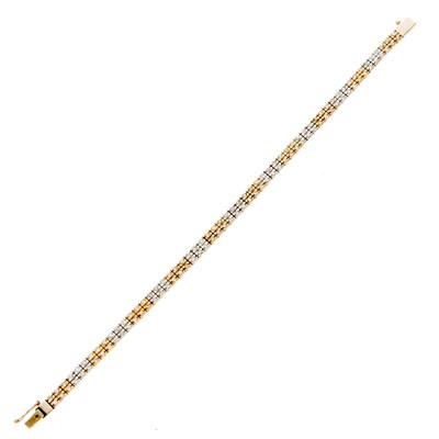 Lot 1063 - Two-Color Gold and Simulated Diamond Bracelet