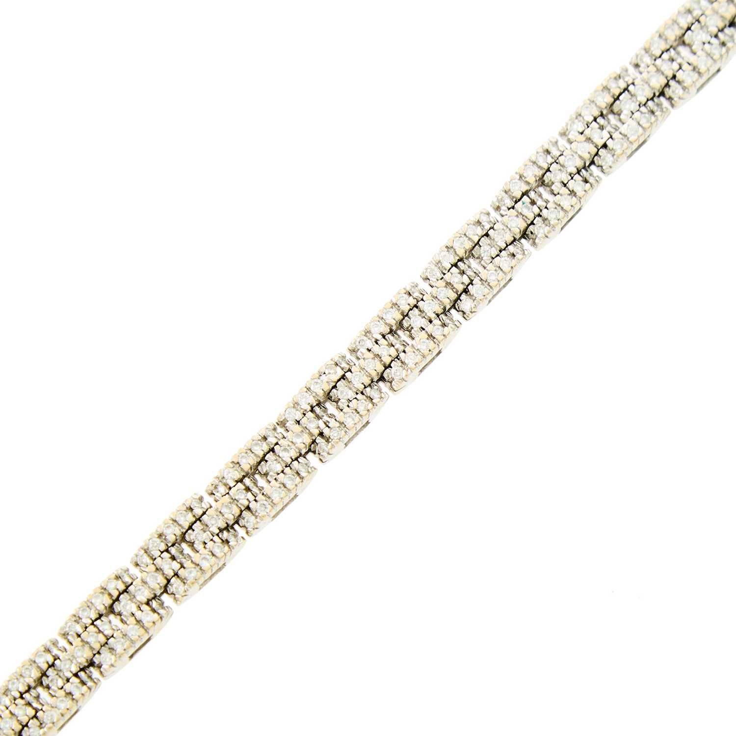 Lot 1083 - White Gold and Diamond Link Bracelet