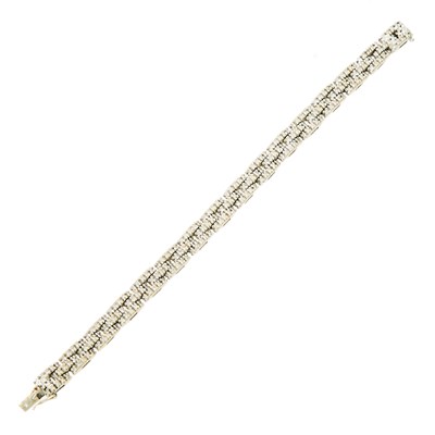 Lot 1083 - White Gold and Diamond Link Bracelet