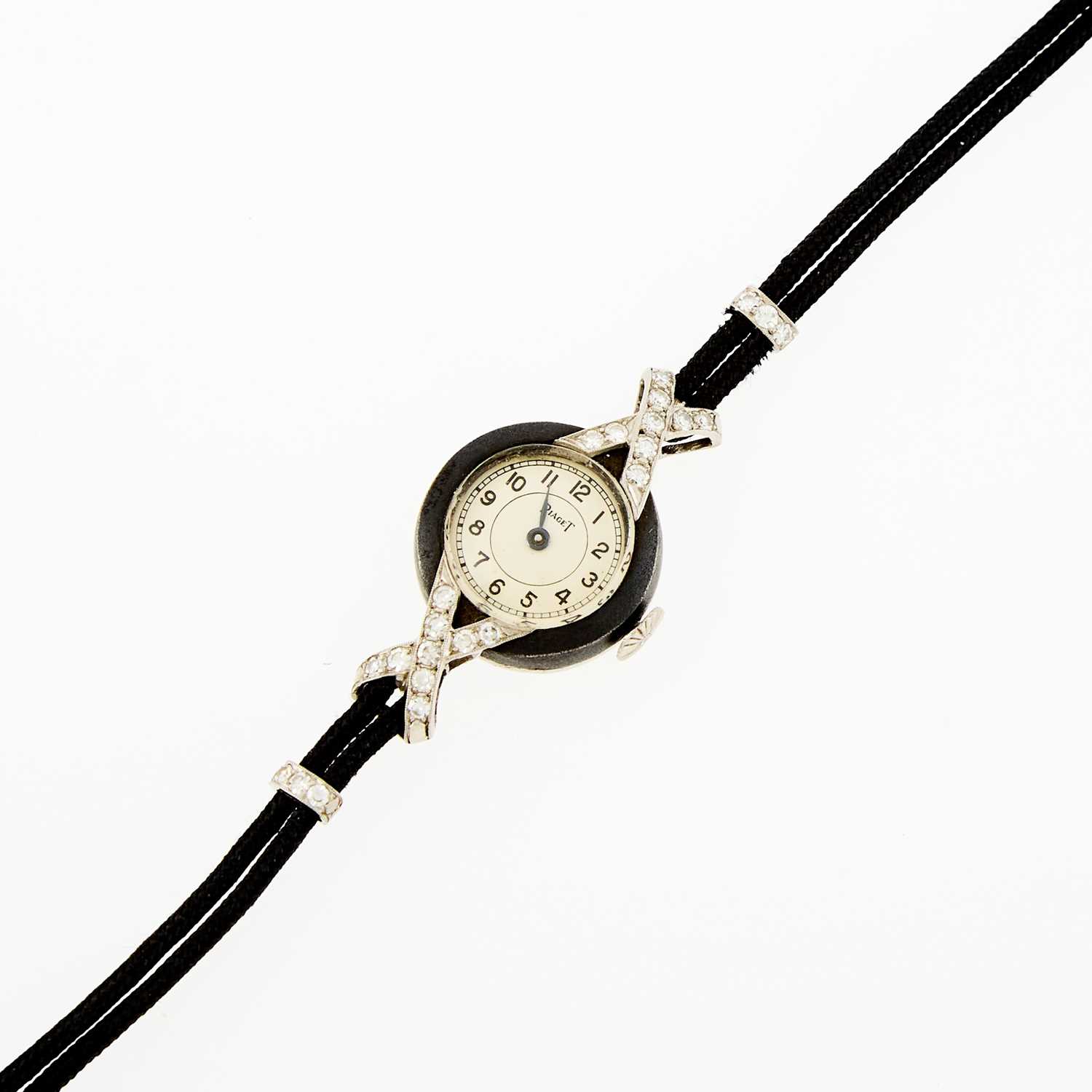 Lot 1214 - Piaget Oxidized Silver, Platinum and Diamond Wristwatch, Retailed by Marsh & Co.