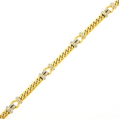 Lot 2225 - Two-Color Gold and Diamond Curb Link Bracelet