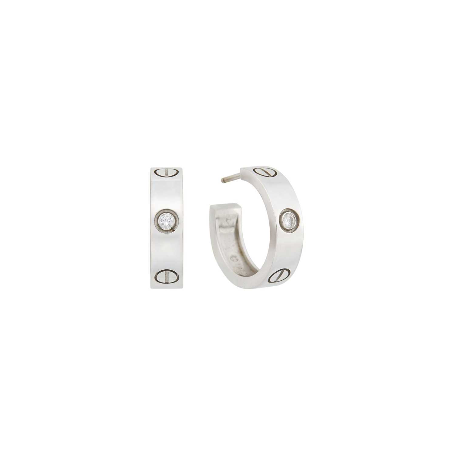 Lot 55 - Cartier Pair of White Gold and Diamond 'Love' Hoop Earrings
