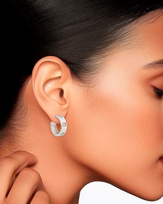 Lot 55 - Cartier Pair of White Gold and Diamond 'Love' Hoop Earrings