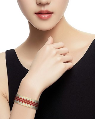 Lot 35 - Two-Color Gold, Ruby and Diamond Bracelet