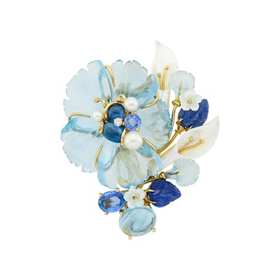 Lot 50 - Seaman Schepps White Gold, Carved and Cabochon Blue Topaz, Sapphire, Mother-of-Pearl, Aquamarine, Cultured Pearl and Diamond Flower Clip-Brooch