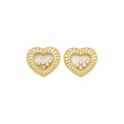 Lot 137 - Chopard Pair of Gold, Carved Mother-of-Pearl, Floating Diamond and Diamond 'Happy Diamond' Heart Earclips