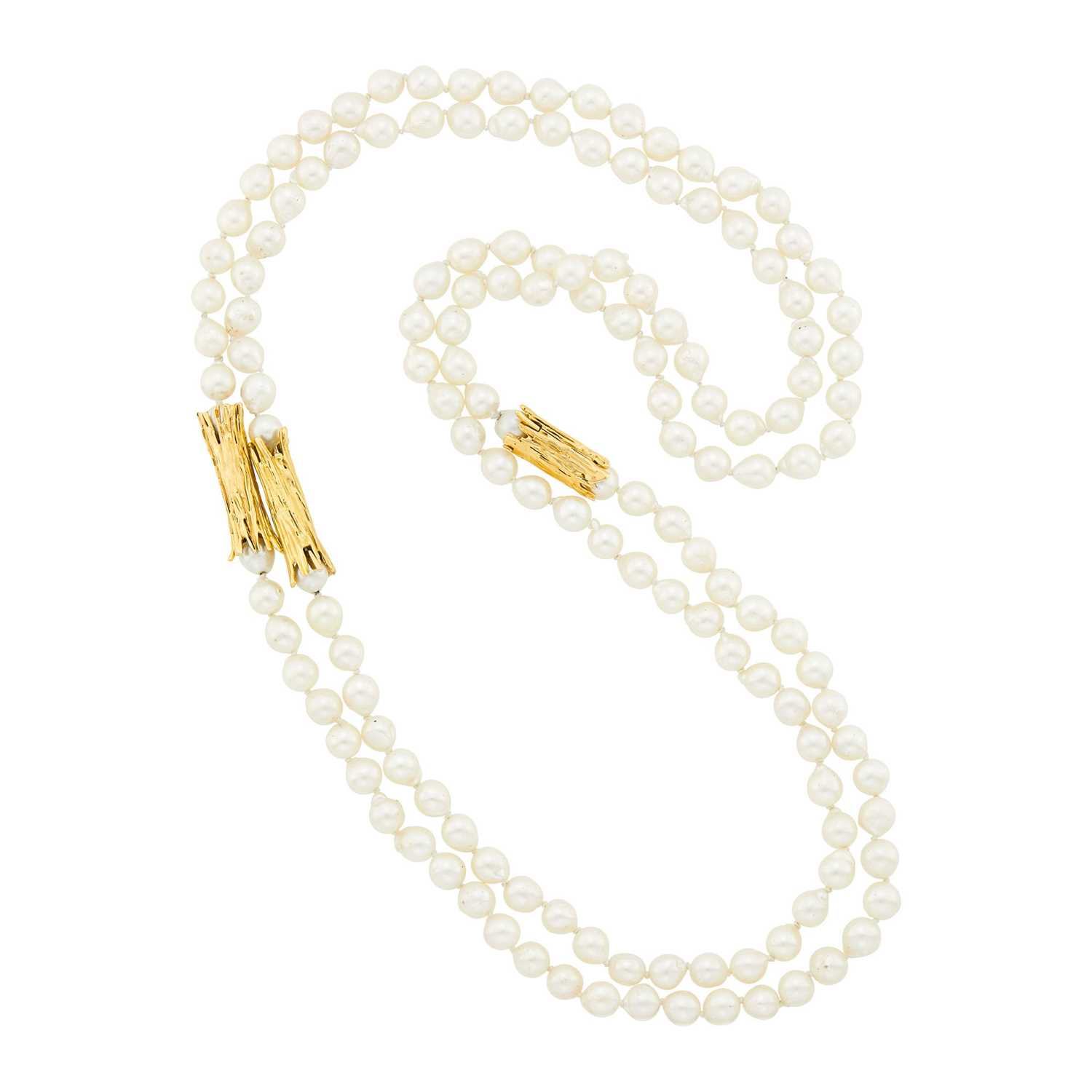 Lot 1076 - Long Semi-Baroque Cultured Pearl and Gold Necklace