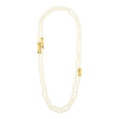 Lot 1076 - Long Semi-Baroque Cultured Pearl and Gold Necklace