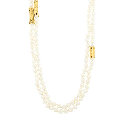 Lot 1076 - Long Semi-Baroque Cultured Pearl and Gold Necklace