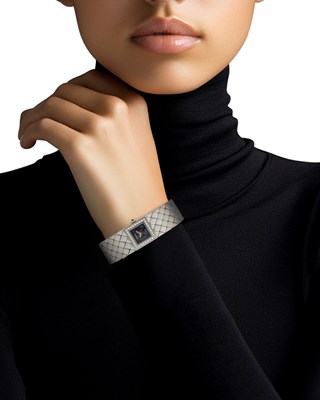 Lot 77 - Chanel Stainless Steel and Diamond 'Matelasse' Wristwatch